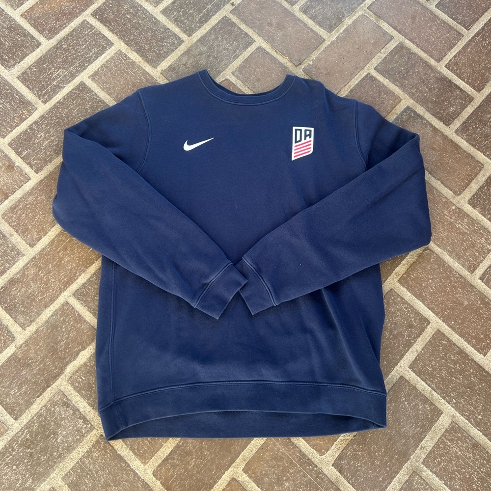 Navy blue Nike crewneck sweatshirt with white logo